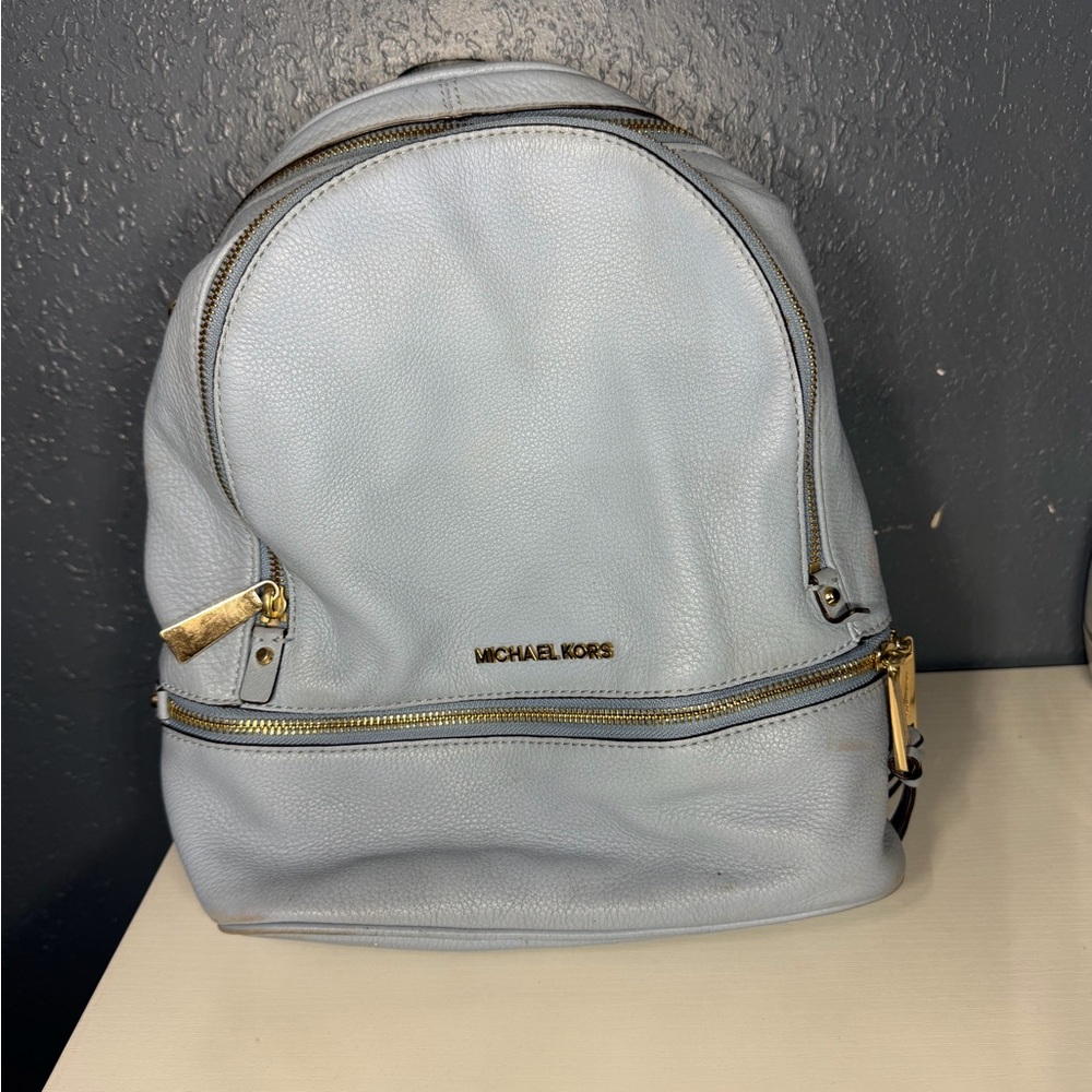 Michael Kors Sky Blue Backpack with Gold Details